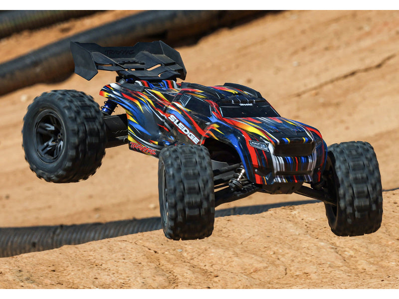Traxxas Sledge 1:8 RTR oranžový s belted pneu